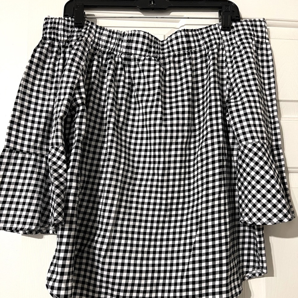 Black and white checkered blouse